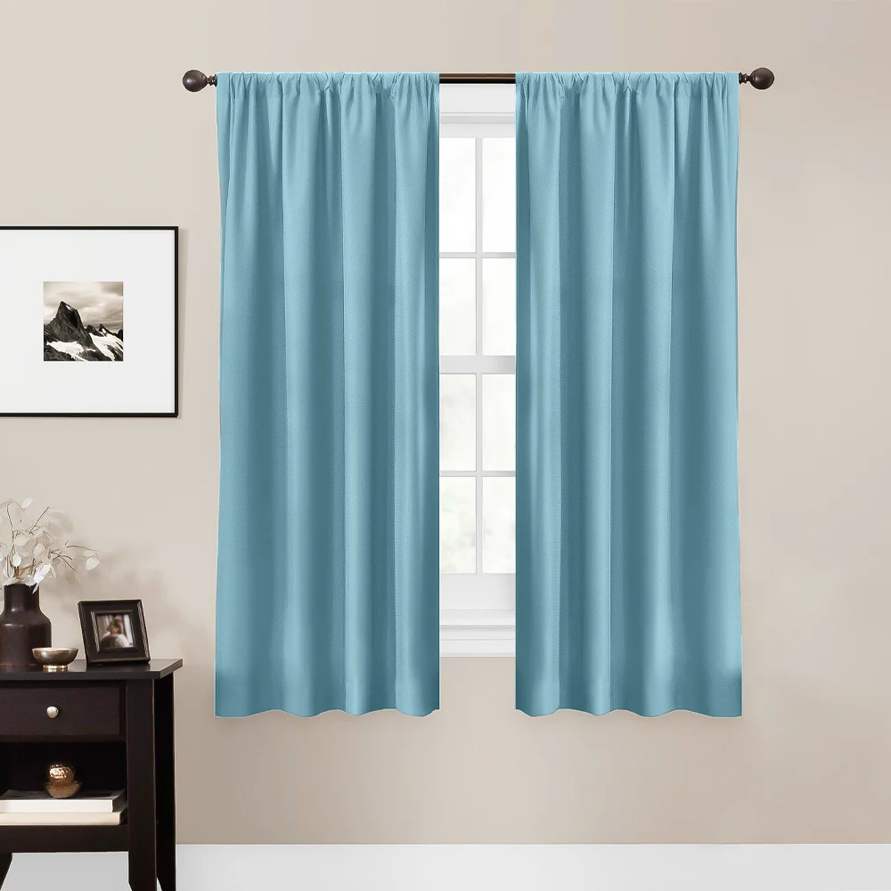 Soft blue color curtains for cream walls