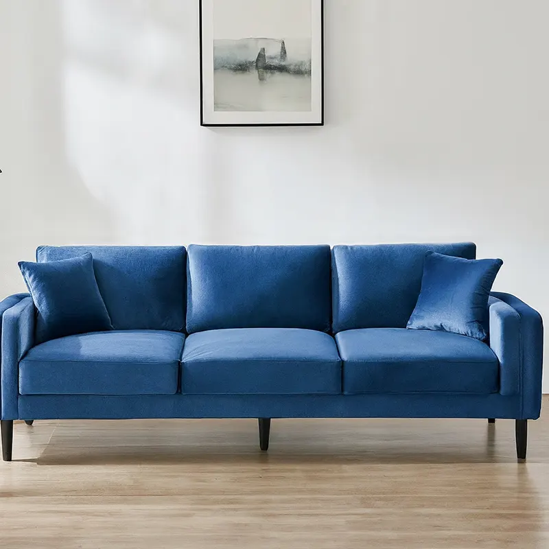 Arctic Blue Velvet Couch and White Walls