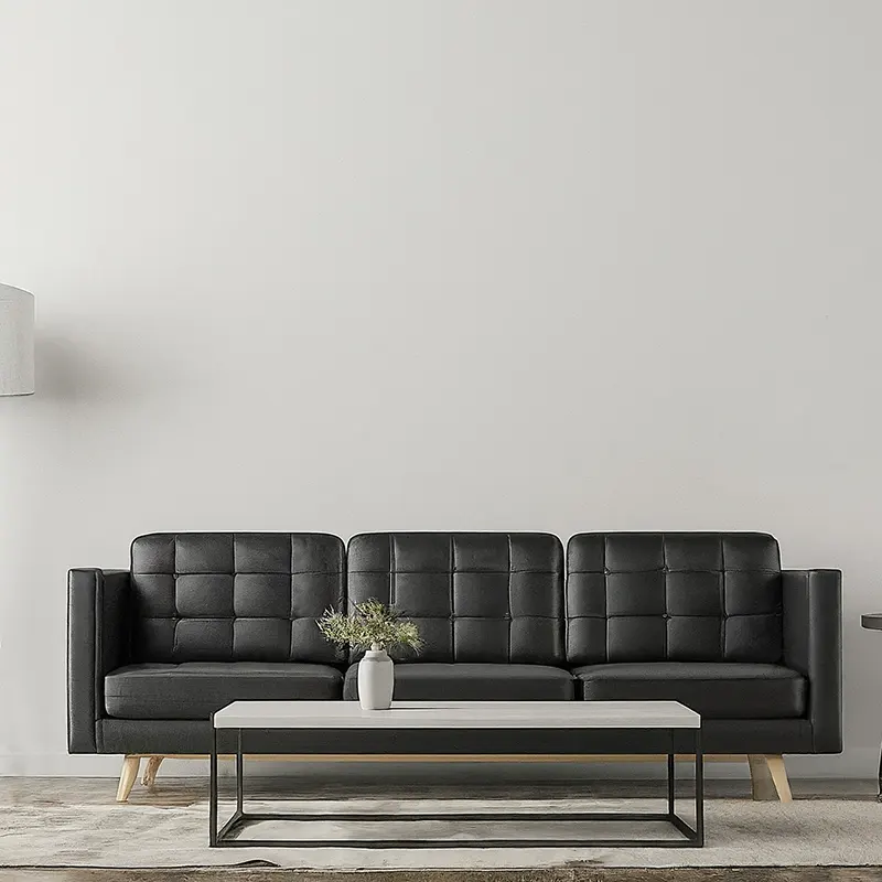 Black Couch and White Walls