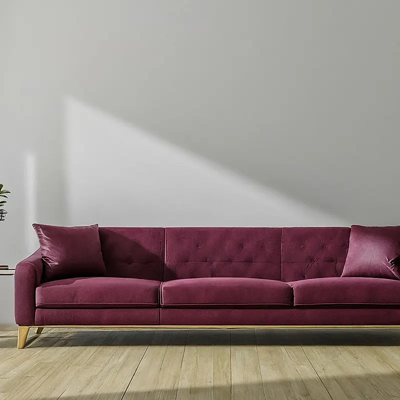Burgundy Couch and White Walls