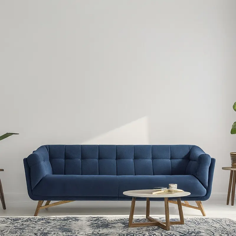 Navy Blue Couch and White Walls